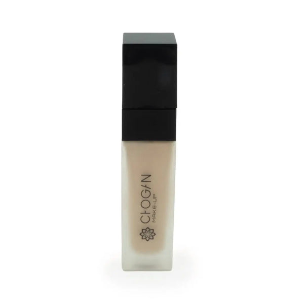 Chogan Make-Up Instant Matte Foundation LM12 Pink Nude: Eleganter Flakon mit schwarzem Deckel und dem Chogan Make-Up Logo, gefüllt mit der flüssigen Foundation im hellen, rosé-beigen Farbton Pink Nude, auf weißem Hintergrund.
